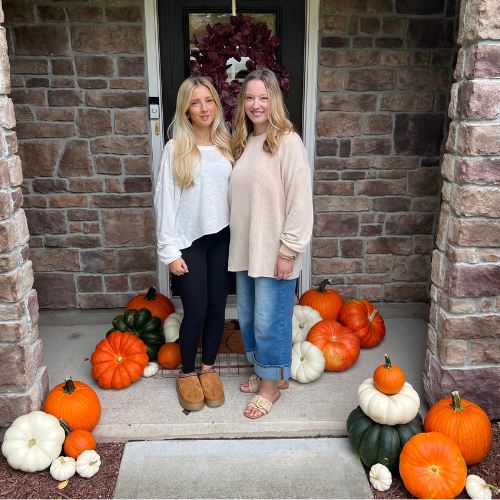 Amanda and Ally of Fall Porch Charm on a decorated fall porch