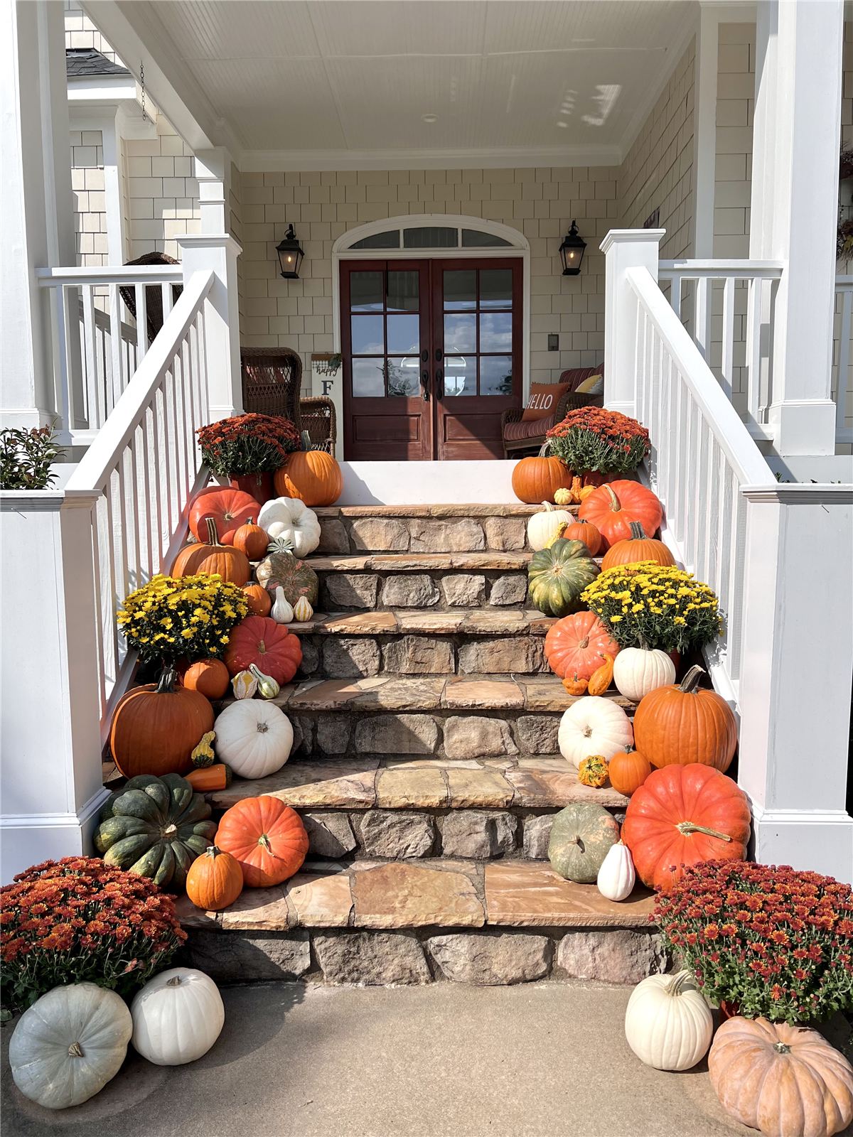 Fall porch decorating with heirloom pumpkins and mums at a Triangle, NC home